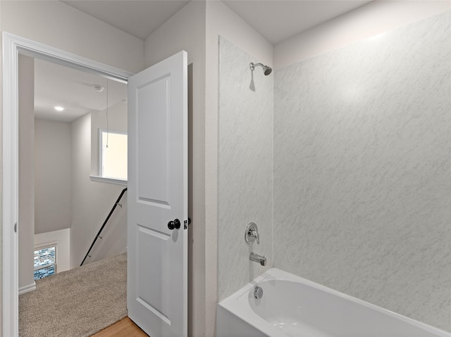 bathroom with  shower combination and a wealth of natural light