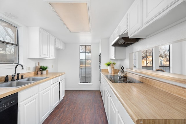 kitchen featuring sink, white cabinets, dark hardwood / wood-style floors, and black appliances