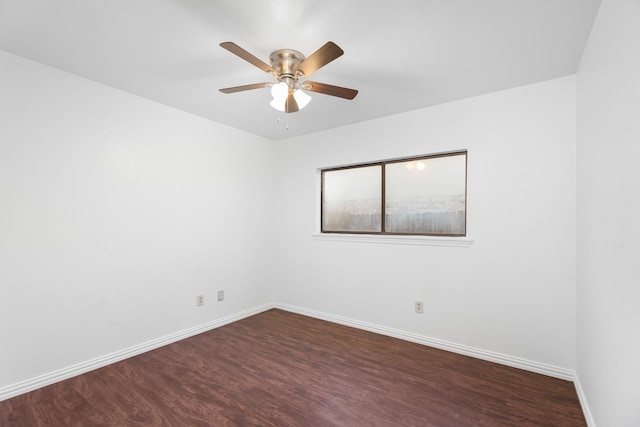 unfurnished room featuring ceiling fan and dark hardwood / wood-style flooring