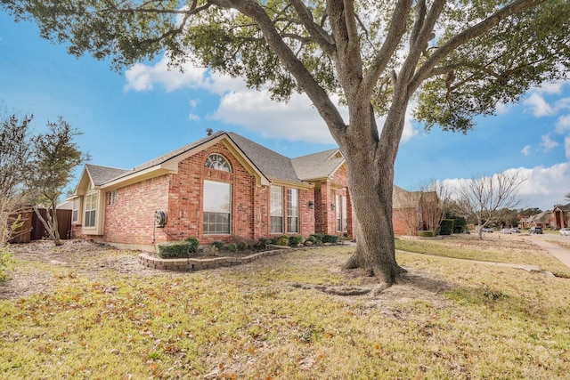 view of property exterior with a yard