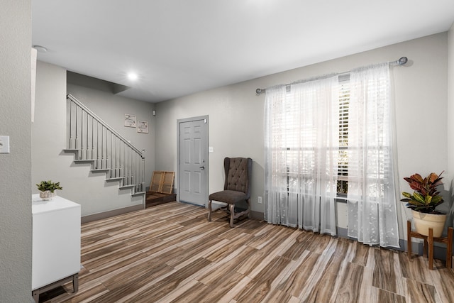 living area with wood-type flooring