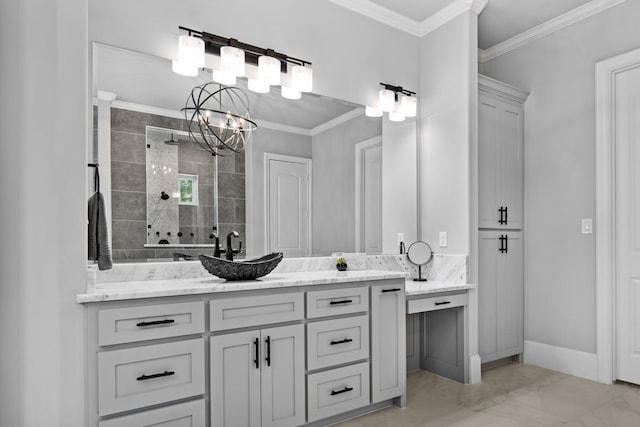 bathroom with vanity, ornamental molding, a chandelier, and tiled shower