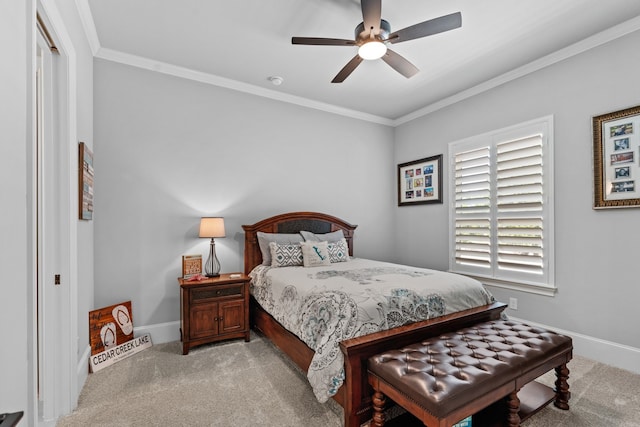 bedroom with ornamental molding, light carpet, and ceiling fan