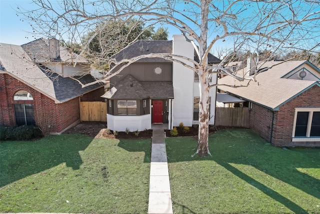 view of property with a front lawn