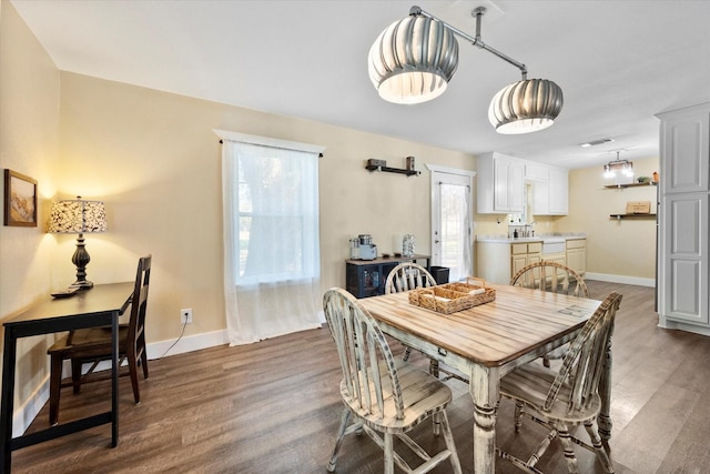 207 Granbury Ct, Granbury, TX 76049 - dining area with wood finished floors and baseboards