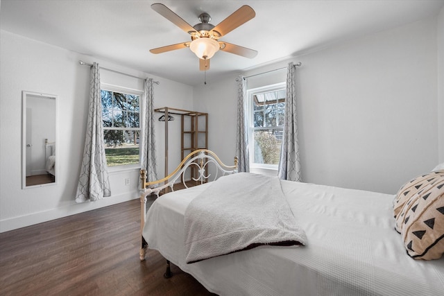 207 Granbury Ct, Granbury, TX 76049 - bedroom with multiple windows, wood finished floors, baseboards, and ceiling fan
