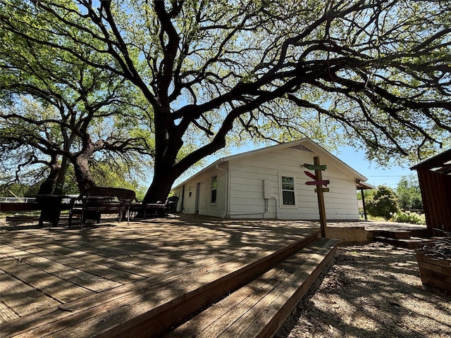 207 Granbury Ct, Granbury, TX 76049 - view of side of home featuring a deck