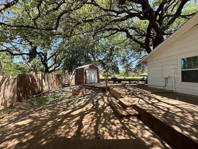 207 Granbury Ct, Granbury, TX 76049 - view of patio / terrace featuring a garage