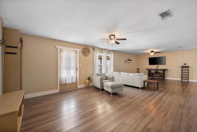 207 Granbury Ct, Granbury, TX 76049 - living room featuring a ceiling fan, wood finished floors, and baseboards