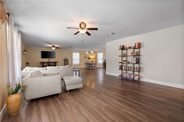 207 Granbury Ct, Granbury, TX 76049 - living room with a ceiling fan, wood finished floors, and baseboards