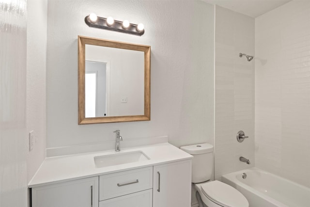 full bathroom featuring vanity, toilet, and tiled shower / bath