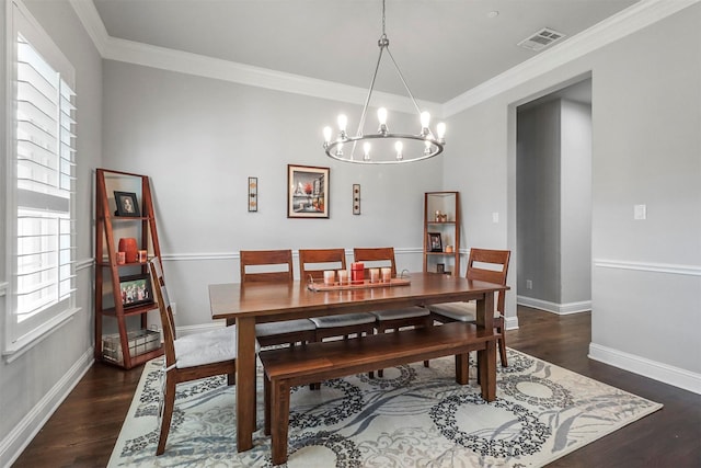 dining area with a wealth of natural light, ornamental molding, and dark hardwood / wood-style floors