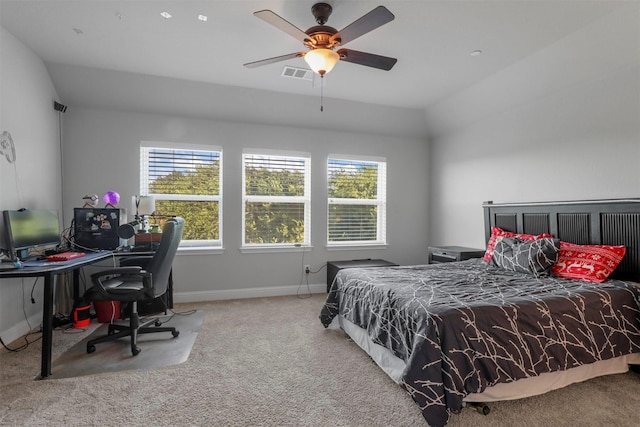 carpeted bedroom featuring visible vents, multiple windows, and baseboards