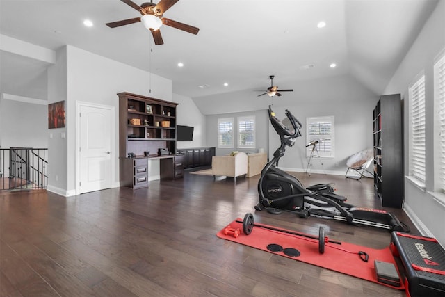 exercise room featuring recessed lighting, lofted ceiling, ceiling fan, and dark wood finished floors