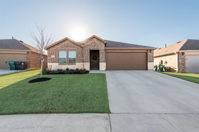 ranch-style home featuring a garage and a front yard