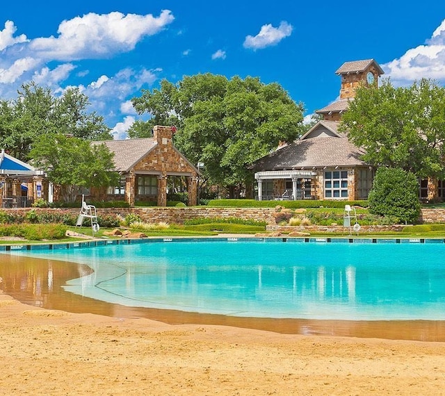 view of pool featuring a pergola and a gazebo