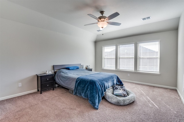 bedroom featuring vaulted ceiling, carpet, and ceiling fan