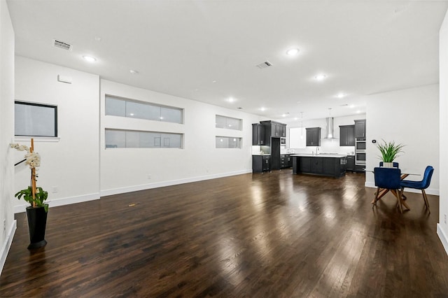 living room featuring dark hardwood / wood-style flooring