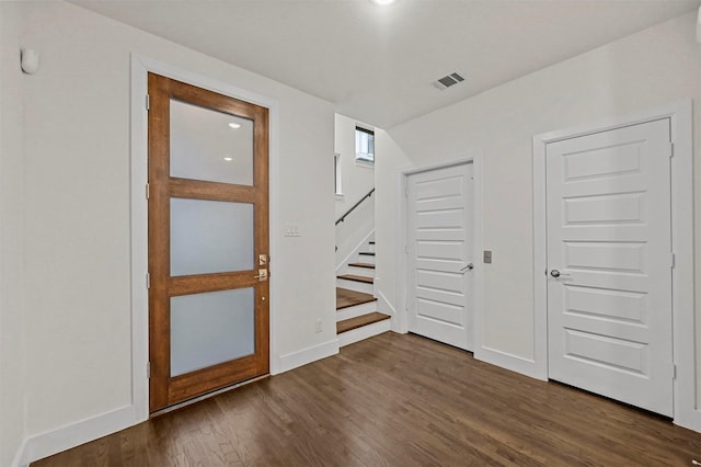 interior space with dark hardwood / wood-style flooring