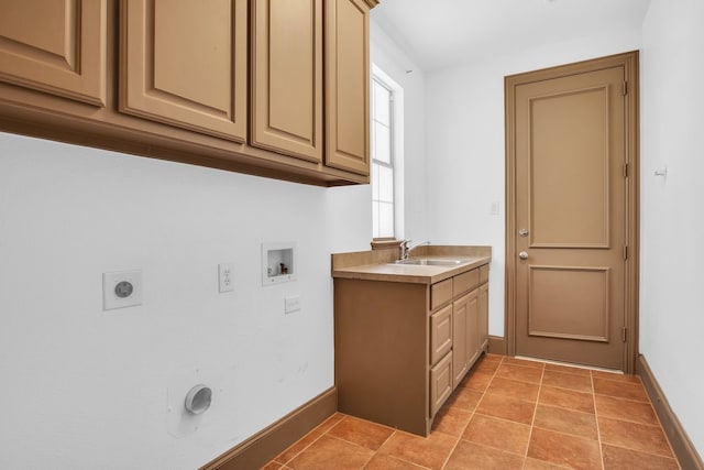 laundry room with sink, cabinets, light tile patterned floors, washer hookup, and hookup for an electric dryer