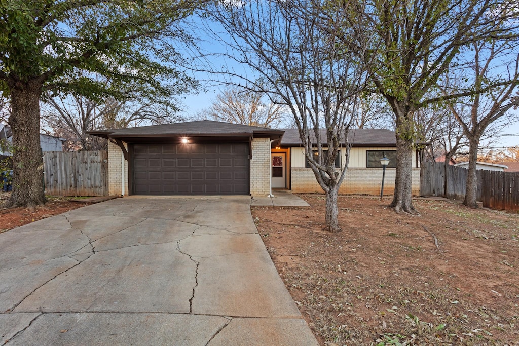 single story home with a garage