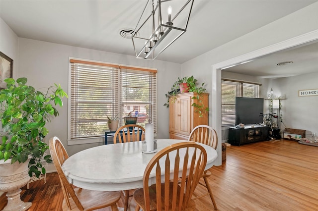 dining room featuring light hardwood / wood-style floors