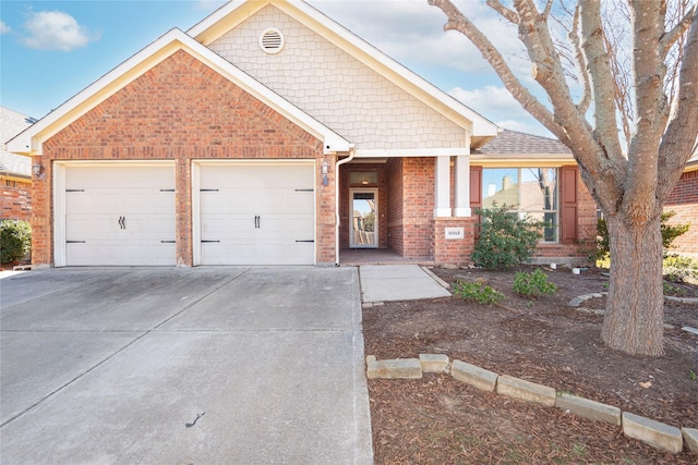 view of front of home with a garage