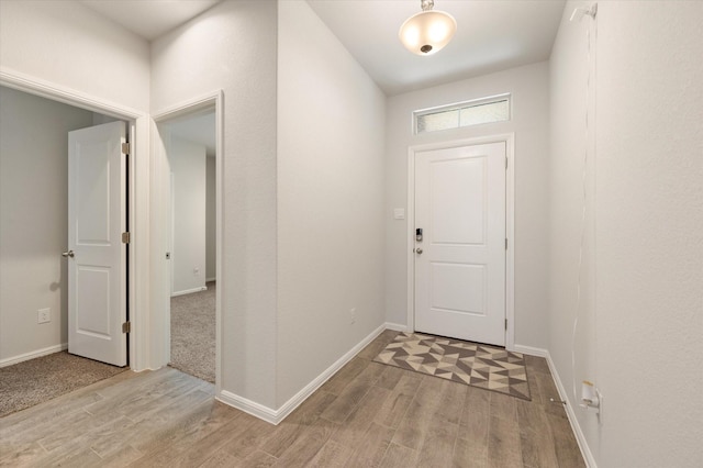 entrance foyer with light hardwood / wood-style flooring