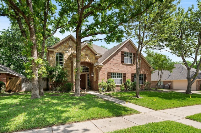 1417 Flying Jib Dr, Azle, TX 76020 - traditional home featuring brick siding and stone siding
