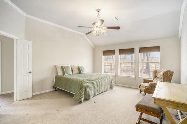 carpeted bedroom featuring ceiling fan, ornamental molding, and lofted ceiling