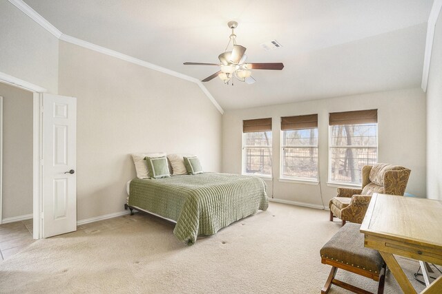 bedroom with light carpet, connected bathroom, ornamental molding, and ceiling fan