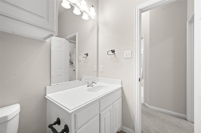 1417 Flying Jib Dr, Azle, TX 76020 - bathroom featuring vanity, toilet, and baseboards