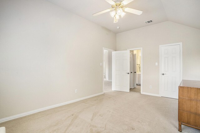 bathroom featuring tile patterned floors, toilet, a shower with door, and vanity