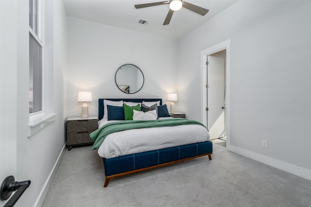 carpeted bedroom featuring ceiling fan