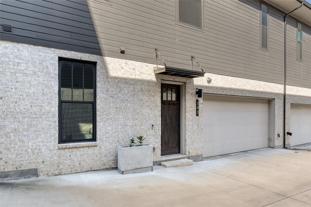 entrance to property with a garage