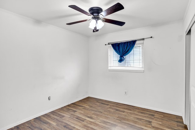 unfurnished bedroom featuring crown molding, ceiling fan, and hardwood / wood-style floors