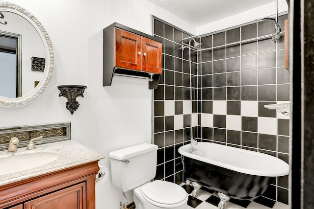 full bathroom with vanity, tiled shower / bath, tile walls, and toilet