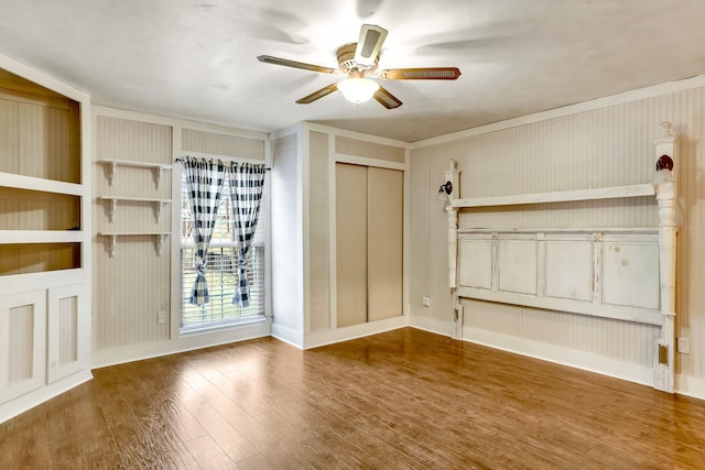 interior space featuring hardwood / wood-style flooring and ceiling fan