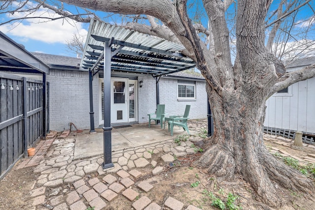 view of patio featuring a pergola