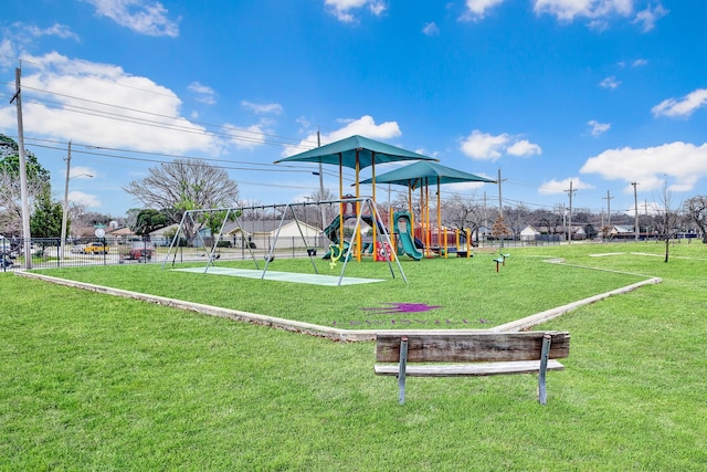 view of play area featuring a lawn