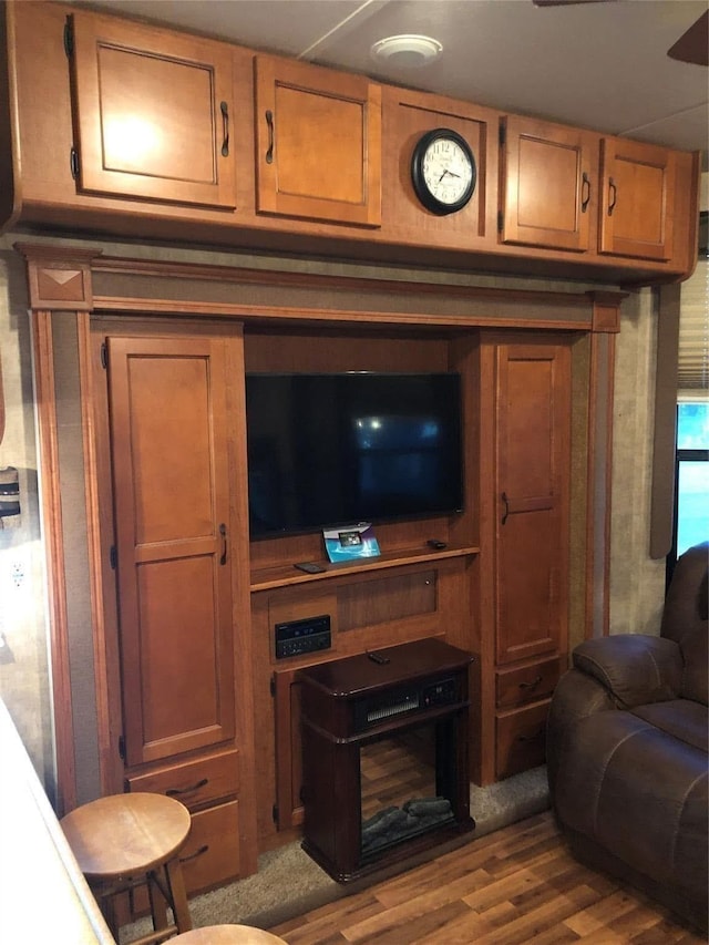 living room with light hardwood / wood-style flooring