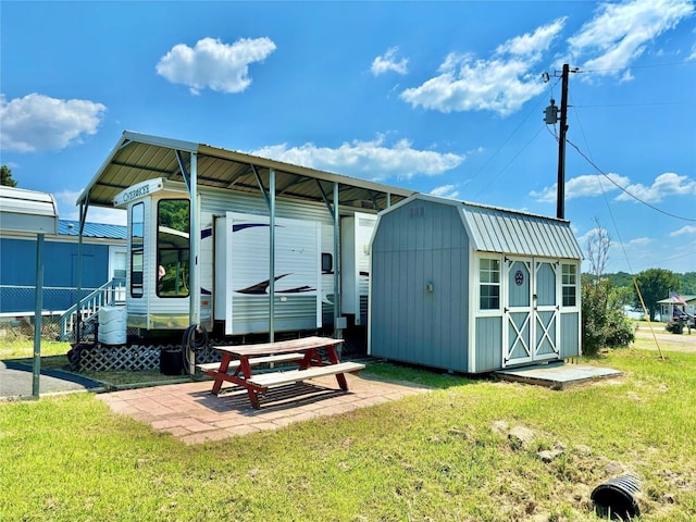 view of outdoor structure with a lawn