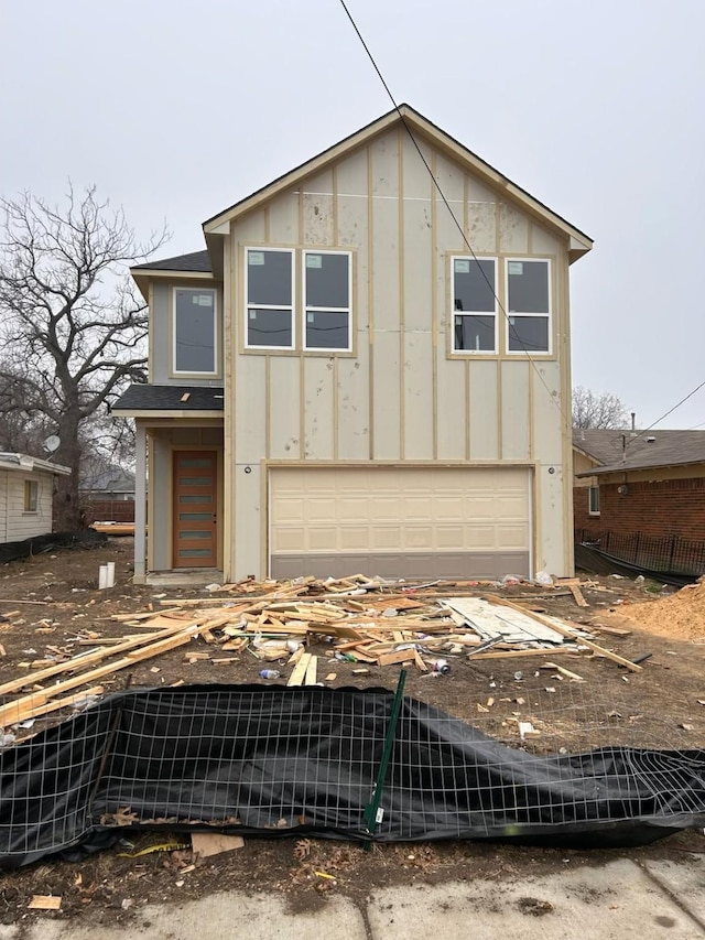 view of front of property with a garage