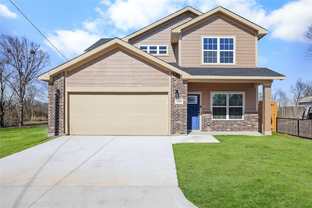 view of front of property with a garage, a front lawn, and a porch