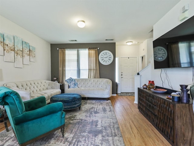 living room with hardwood / wood-style floors