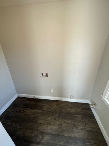 laundry room featuring dark hardwood / wood-style floors and washer hookup