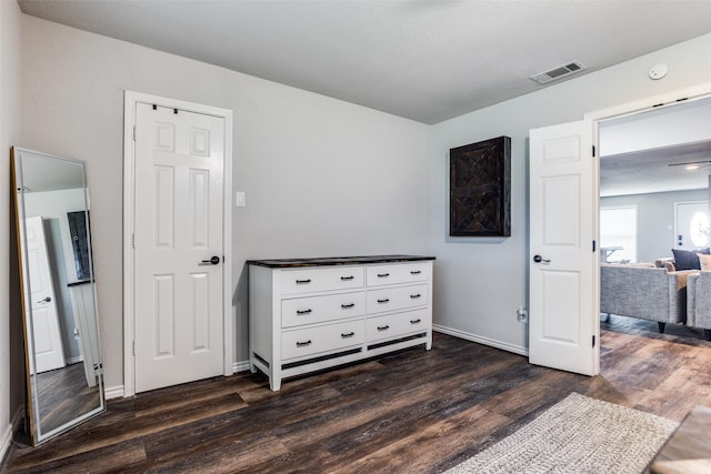 bedroom featuring dark hardwood / wood-style floors