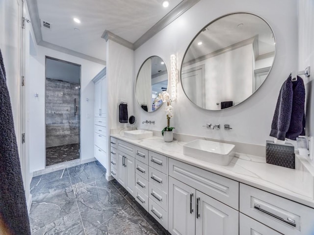 bathroom featuring vanity, crown molding, and a tile shower