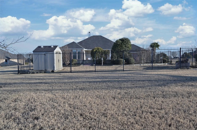 view of front of home featuring a shed