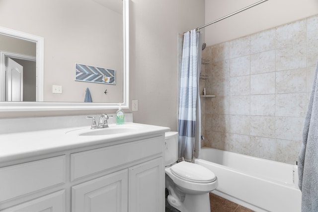 full bathroom featuring shower / tub combo with curtain, vanity, toilet, and tile patterned flooring